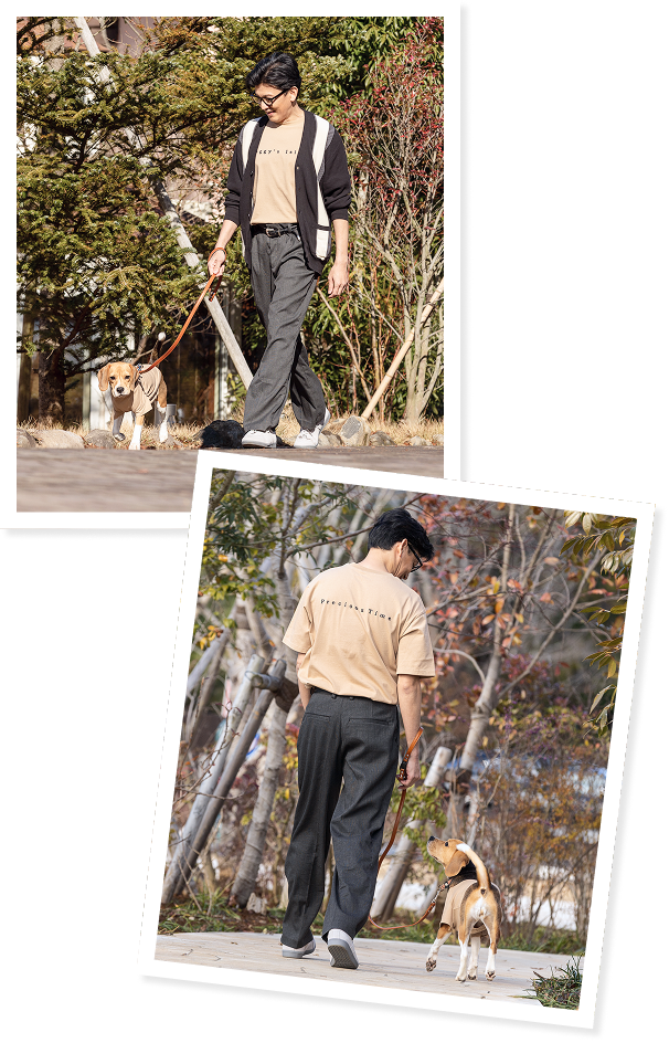 犬の散歩をする男性の写真