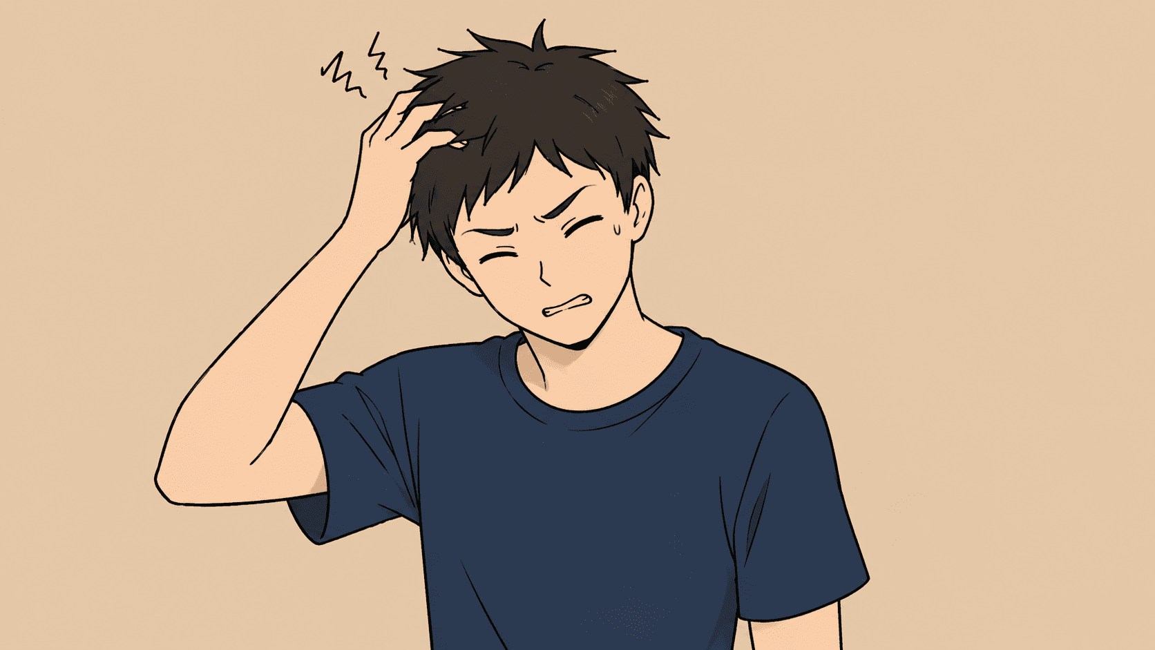 頭皮を痒そうにしている男性