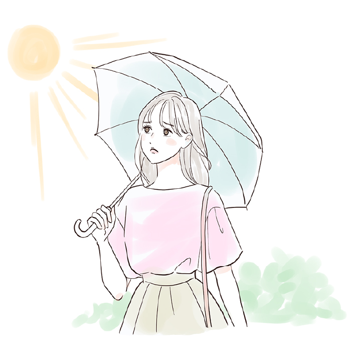 日傘をさす女性