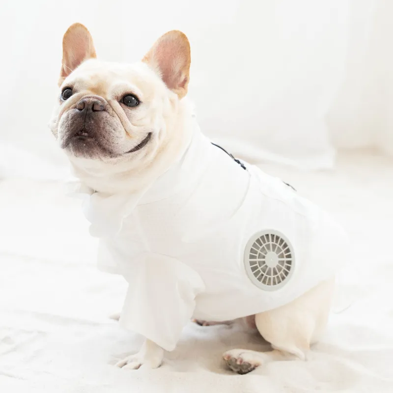 Inflating cooling jacket for dogs with two fans, featured by Reuters and CNN