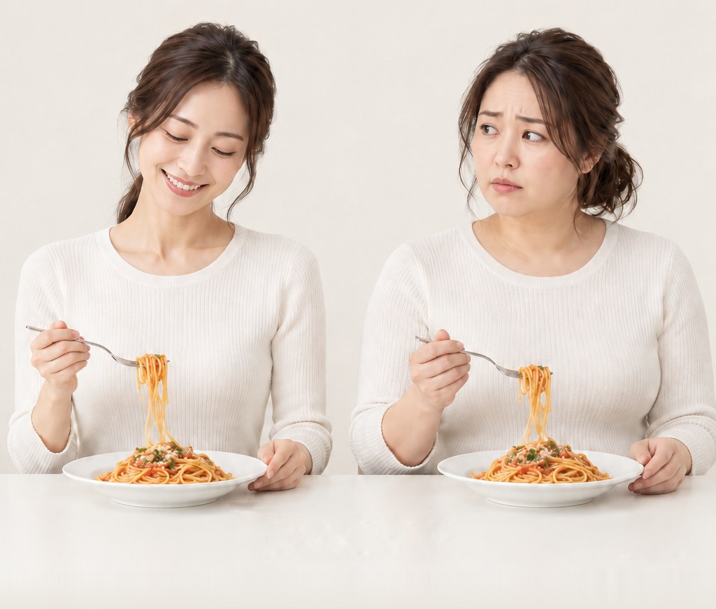 同じ量のパスタを食べる2人の女性