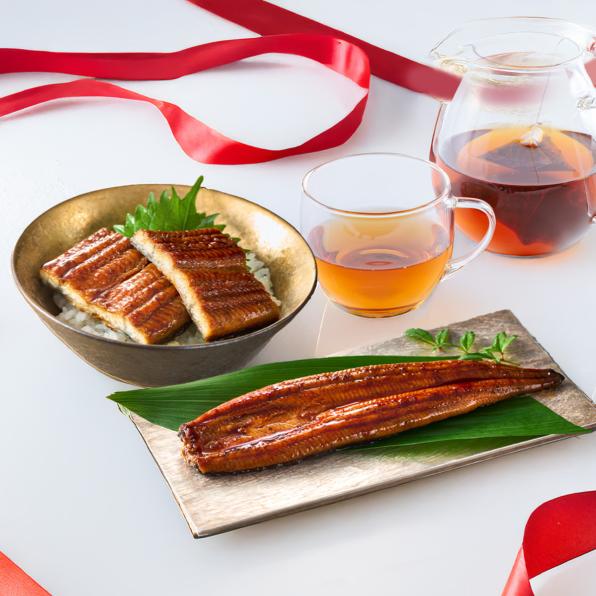 【送料無料】<br>【鰻楽公式限定】母の日セット<br>（長焼1尾＋切身2袋＋お友茶×２）