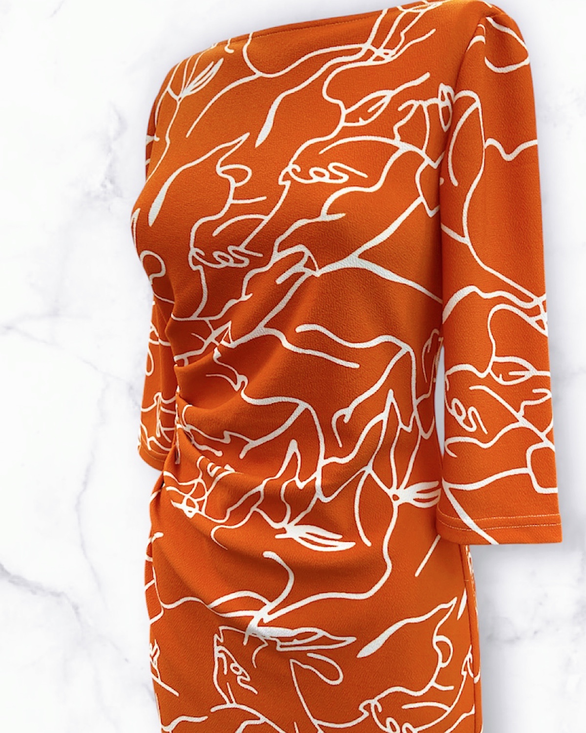 オレンジアートフラワードレープワンピース