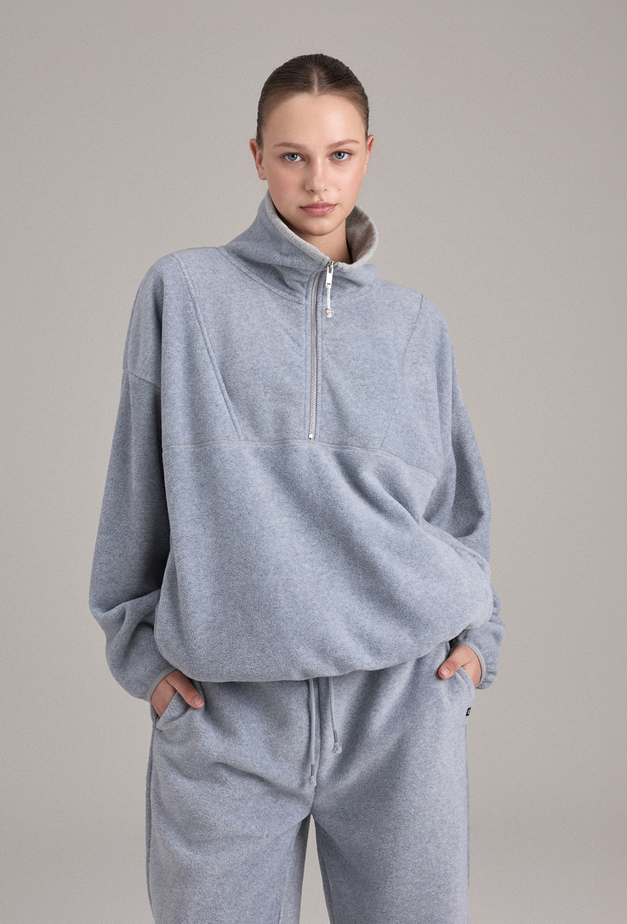 TL157 FLEECE HALF-ZIP TOP L.MELANGE GRAY SOLID