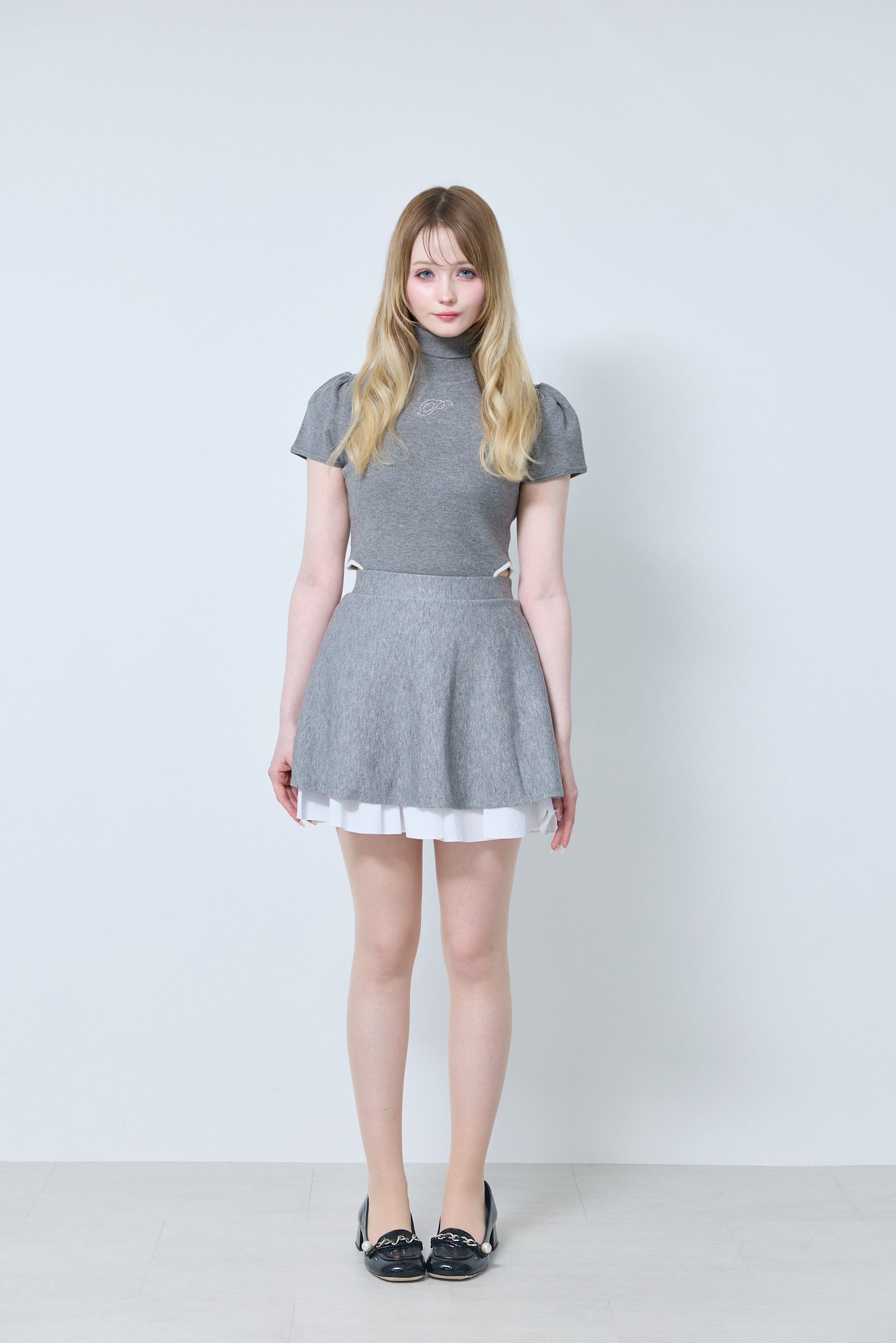 PLEATED KNIT SKIRT